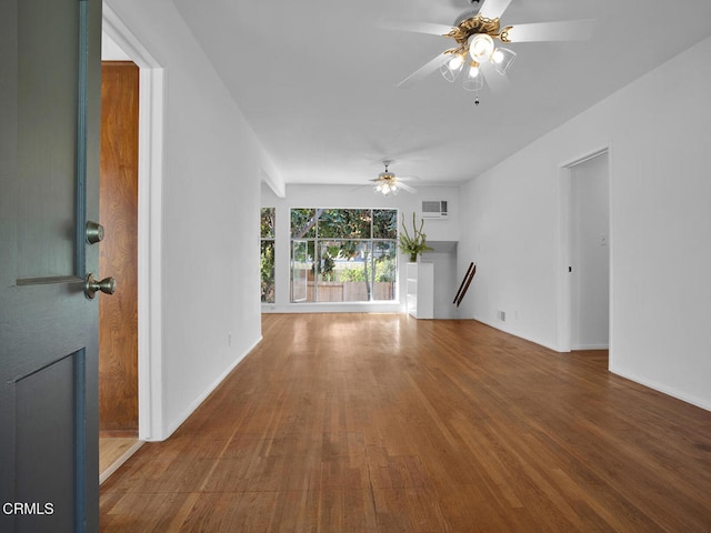 966 E Edgecomb St, Covina, CA 91724 - unfurnished living room featuring a ceiling fan, baseboards, and wood finished floors
