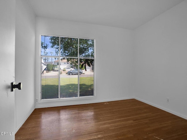 966 E Edgecomb St, Covina, CA 91724 - empty room with baseboards and wood finished floors