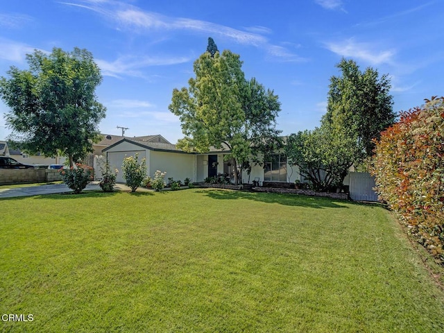 966 E Edgecomb St, Covina, CA 91724 - view of front facade featuring stucco siding and a front yard