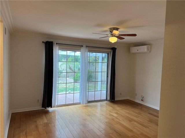 interior space with ornamental molding, a wall mounted AC, baseboards, light wood-type flooring, and a ceiling fan