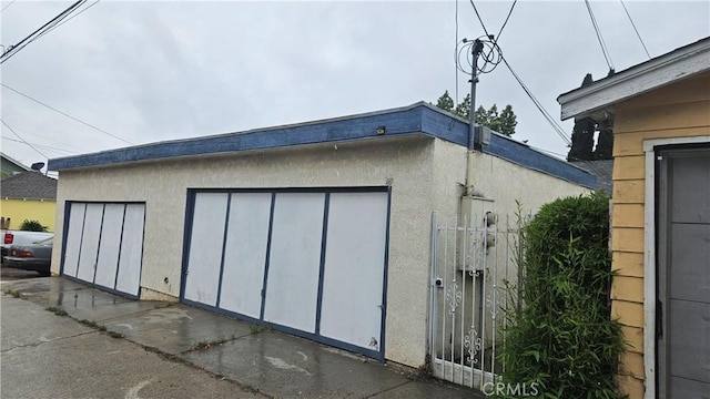 garage featuring a gate