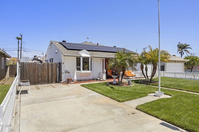 1213 Doris Ave, Oxnard, CA 93030 - bungalow-style home featuring solar panels, driveway, a shingled roof, and a gate