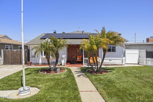 1213 Doris Ave, Oxnard, CA 93030 - single story home featuring solar panels, a gate, and a shingled roof