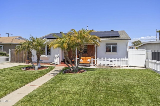 1213 Doris Ave, Oxnard, CA 93030 - view of front of home with solar panels and stucco siding