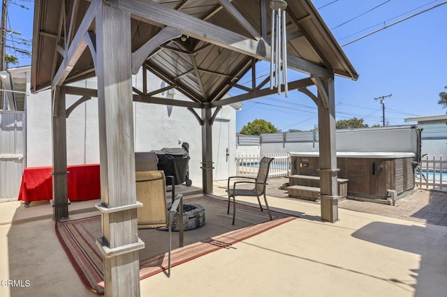 1213 Doris Ave, Oxnard, CA 93030 - view of patio with a hot tub, a gazebo, a swimming pool, and fence