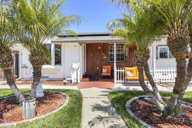 1213 Doris Ave, Oxnard, CA 93030 - view of front of property with roof mounted solar panels and a porch