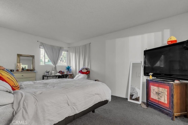 bedroom featuring baseboards and carpet