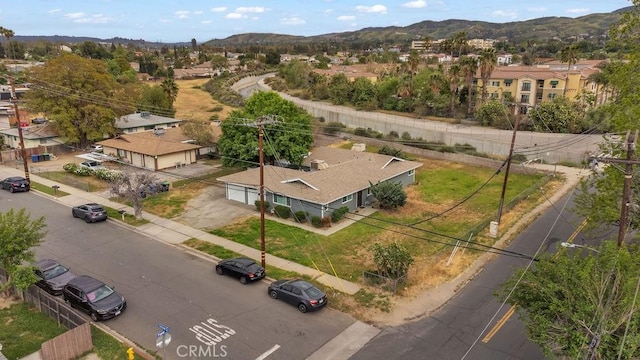 drone / aerial view with a mountain view and a residential view