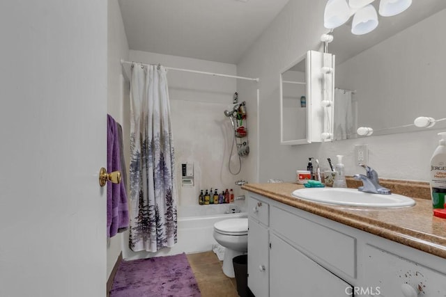 bathroom featuring toilet, vanity, tile patterned flooring, and shower / tub combo