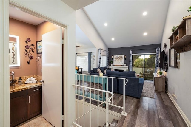 interior space with recessed lighting, baseboards, and light wood finished floors