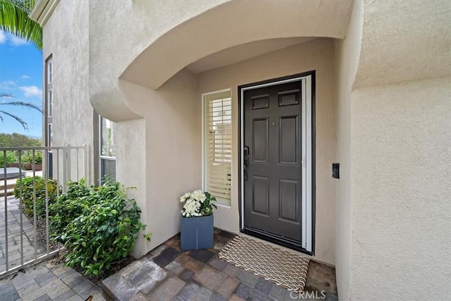 1616 Cormorant Dr, Carlsbad, CA 92011 - view of exterior entry featuring stucco siding