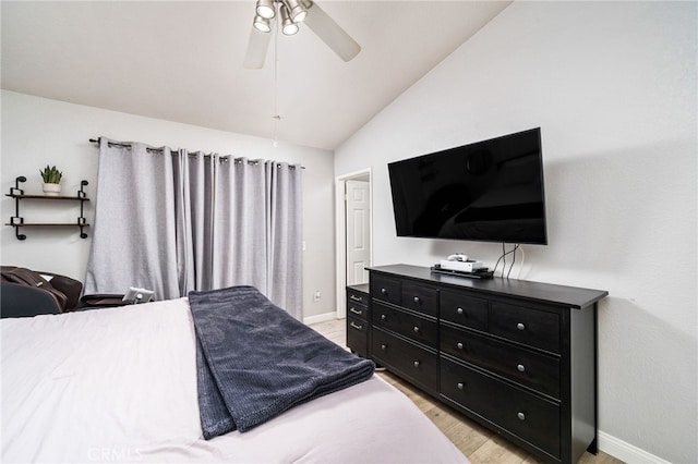 6932 Sundown Dr, Jurupa Valley, CA 92509 - bedroom featuring ceiling fan, baseboards, vaulted ceiling, and light wood-type flooring