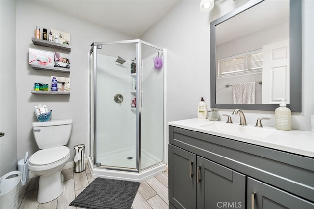6932 Sundown Dr, Jurupa Valley, CA 92509 - full bath featuring a stall shower, toilet, and vanity
