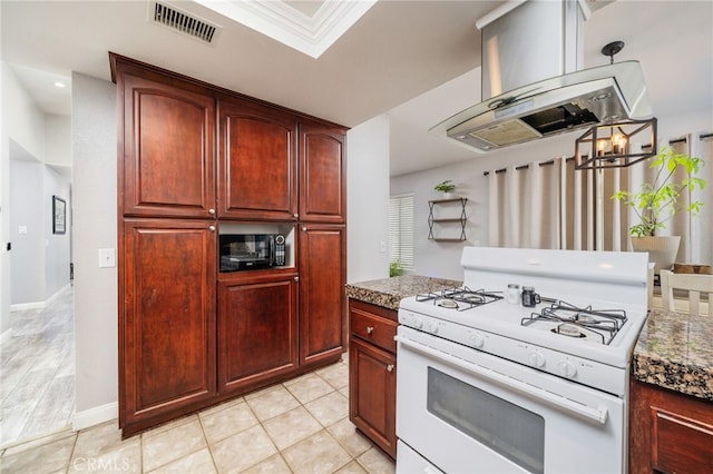 6932 Sundown Dr, Jurupa Valley, CA 92509 - kitchen featuring a notable chandelier, white gas range, reddish brown cabinets, and visible vents