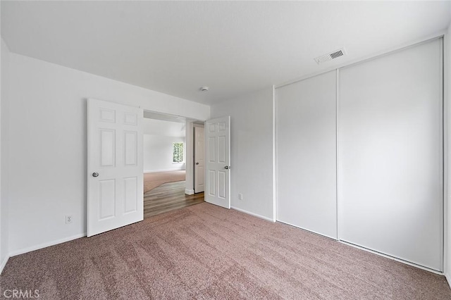 701 Black Oak Cir, Corona, CA 92881 - interior space featuring baseboards, visible vents, and carpet