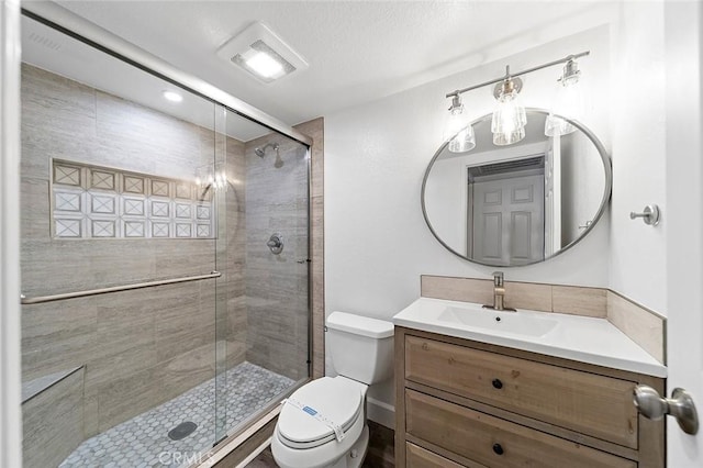 701 Black Oak Cir, Corona, CA 92881 - bathroom featuring vanity, visible vents, toilet, and a shower stall