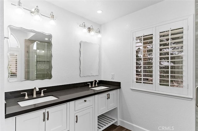 701 Black Oak Cir, Corona, CA 92881 - bathroom with a sink, double vanity, and wood finished floors