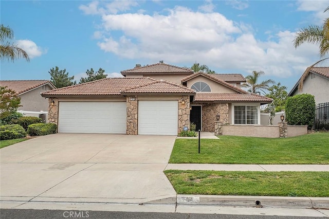 701 Black Oak Cir, Corona, CA 92881 - mediterranean / spanish home with stone siding, a garage, stucco siding, a tiled roof, and driveway