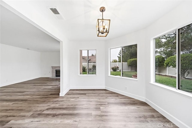 701 Black Oak Cir, Corona, CA 92881 - interior space featuring a chandelier, a wealth of natural light, and wood finished floors