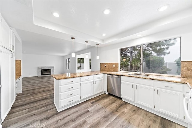 701 Black Oak Cir, Corona, CA 92881 - kitchen with wood finished floors, dishwasher, a sink, light stone counters, and recessed lighting