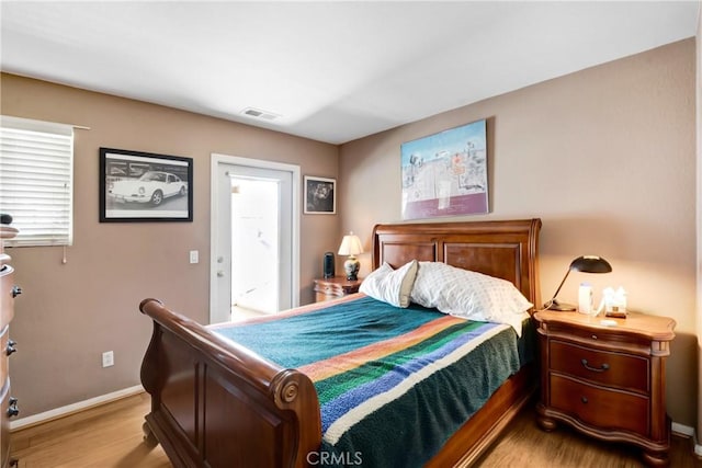 34440 Fawn Ridge Pl, Yucaipa, CA 92399 - bedroom with light wood-style flooring and baseboards