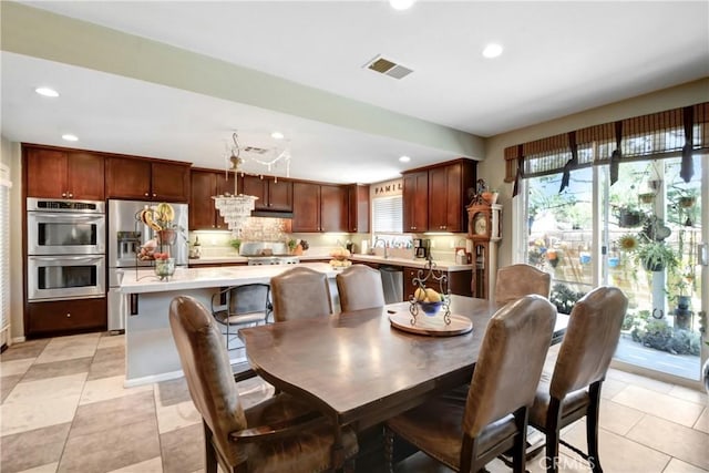 34440 Fawn Ridge Pl, Yucaipa, CA 92399 - dining area with recessed lighting and light tile patterned floors