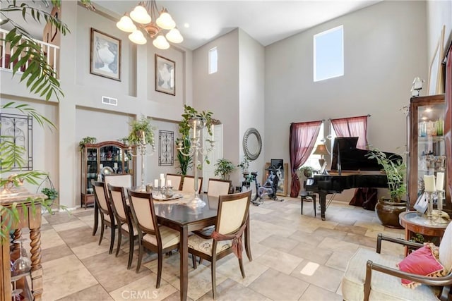 34440 Fawn Ridge Pl, Yucaipa, CA 92399 - dining room featuring a high ceiling, plenty of natural light, and a chandelier