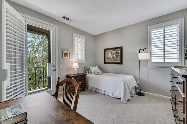 20752 Veneto Way, Porter Ranch, CA 91326 - carpeted bedroom featuring multiple windows and access to exterior