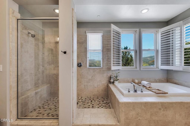 20752 Veneto Way, Porter Ranch, CA 91326 - bathroom featuring a bath, a shower stall, plenty of natural light, and recessed lighting