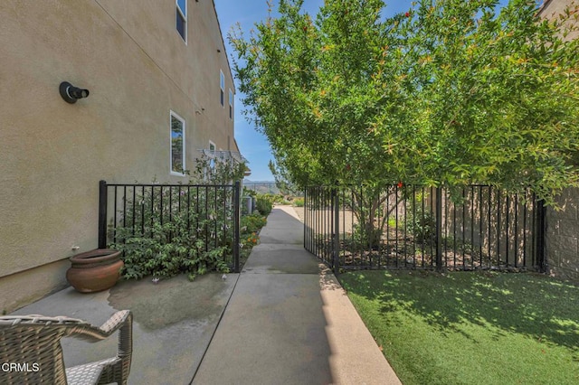 20752 Veneto Way, Porter Ranch, CA 91326 - view of patio featuring a gate