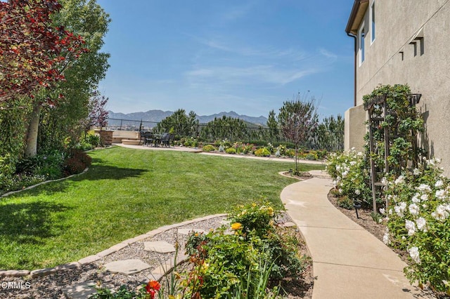 20752 Veneto Way, Porter Ranch, CA 91326 - view of yard featuring a mountain view and a patio
