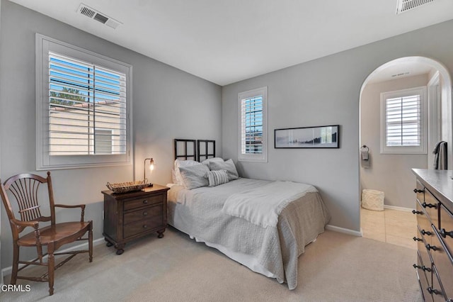 20752 Veneto Way, Porter Ranch, CA 91326 - bedroom featuring multiple windows, carpet, and arched walkways