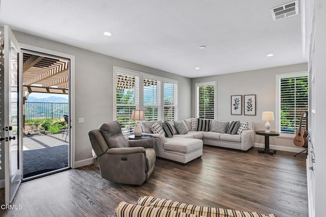 20752 Veneto Way, Porter Ranch, CA 91326 - living room featuring wood finished floors, recessed lighting, and healthy amount of natural light