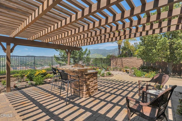 20752 Veneto Way, Porter Ranch, CA 91326 - fenced backyard featuring a mountain view and a patio area