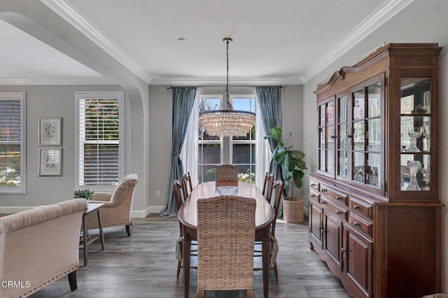 20752 Veneto Way, Porter Ranch, CA 91326 - dining space with a chandelier, crown molding, and wood finished floors