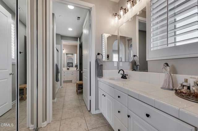 20752 Veneto Way, Porter Ranch, CA 91326 - full bath featuring vanity and tile patterned flooring