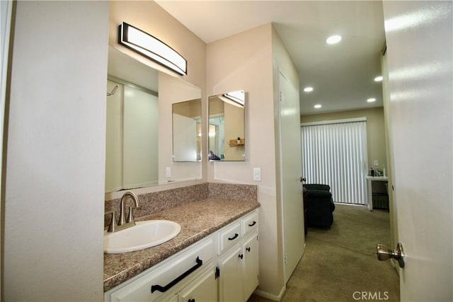 7312 Quill Dr Unit 13, Downey, CA 90242 - bathroom featuring vanity and recessed lighting