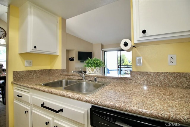 7312 Quill Dr Unit 13, Downey, CA 90242 - kitchen with a sink, dishwasher, white cabinets, light countertops, and lofted ceiling