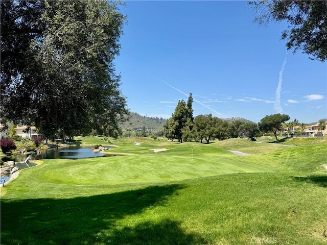 3025 Camino De Las Piedras, El Cajon, CA 92019 - surrounding community featuring view of golf course, a lawn, and a water view