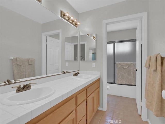 3025 Camino De Las Piedras, El Cajon, CA 92019 - full bathroom featuring double vanity, shower / bath combination with glass door, and tile patterned floors