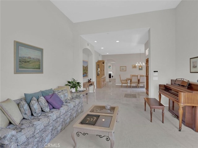 3025 Camino De Las Piedras, El Cajon, CA 92019 - living room with arched walkways, a chandelier, recessed lighting, and carpet flooring