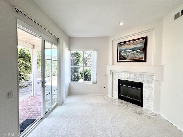 3025 Camino De Las Piedras, El Cajon, CA 92019 - unfurnished living room featuring plenty of natural light, a fireplace, and carpet
