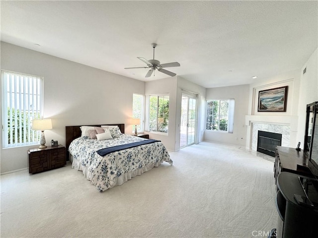 3025 Camino De Las Piedras, El Cajon, CA 92019 - carpeted bedroom featuring a high end fireplace, access to exterior, and ceiling fan