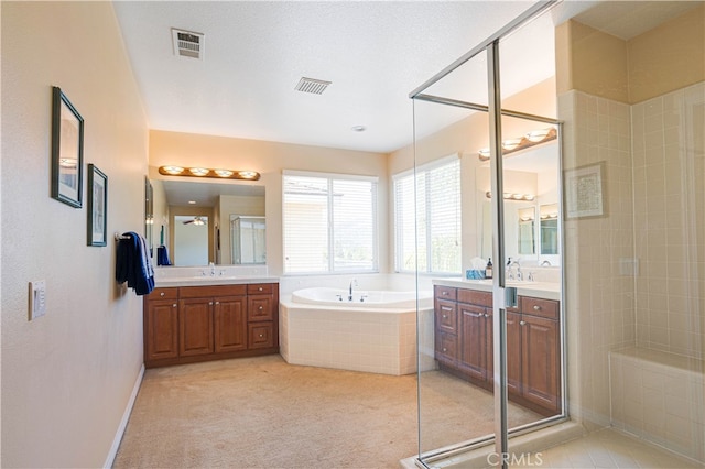22939 Montanya Pl, Murrieta, CA 92562 - bathroom with a bath, two vanities, tiled shower, and baseboards