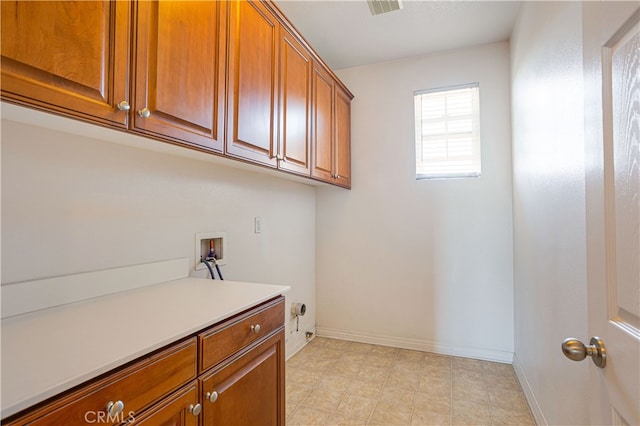 22939 Montanya Pl, Murrieta, CA 92562 - laundry room featuring cabinet space, hookup for a washing machine, and baseboards