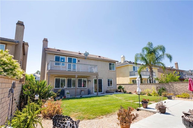 22939 Montanya Pl, Murrieta, CA 92562 - back of property with a balcony, stucco siding, and a patio