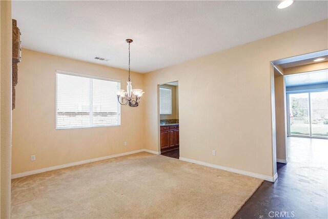 22939 Montanya Pl, Murrieta, CA 92562 - carpeted empty room with a chandelier, baseboards, and recessed lighting