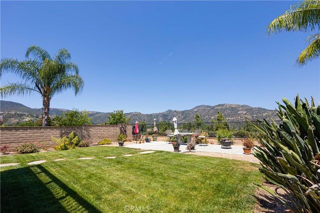 22939 Montanya Pl, Murrieta, CA 92562 - view of yard with a patio and a mountain view
