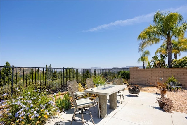 22939 Montanya Pl, Murrieta, CA 92562 - view of patio with an outdoor fire pit