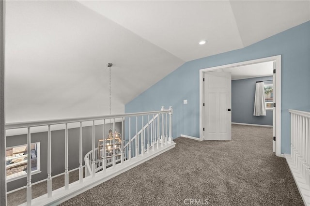 9334 Shamouti Dr, Riverside, CA 92508 - corridor featuring lofted ceiling, an upstairs landing, carpet, baseboards, and recessed lighting